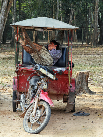 Tuk Tuk driver at rest - Roger Medham